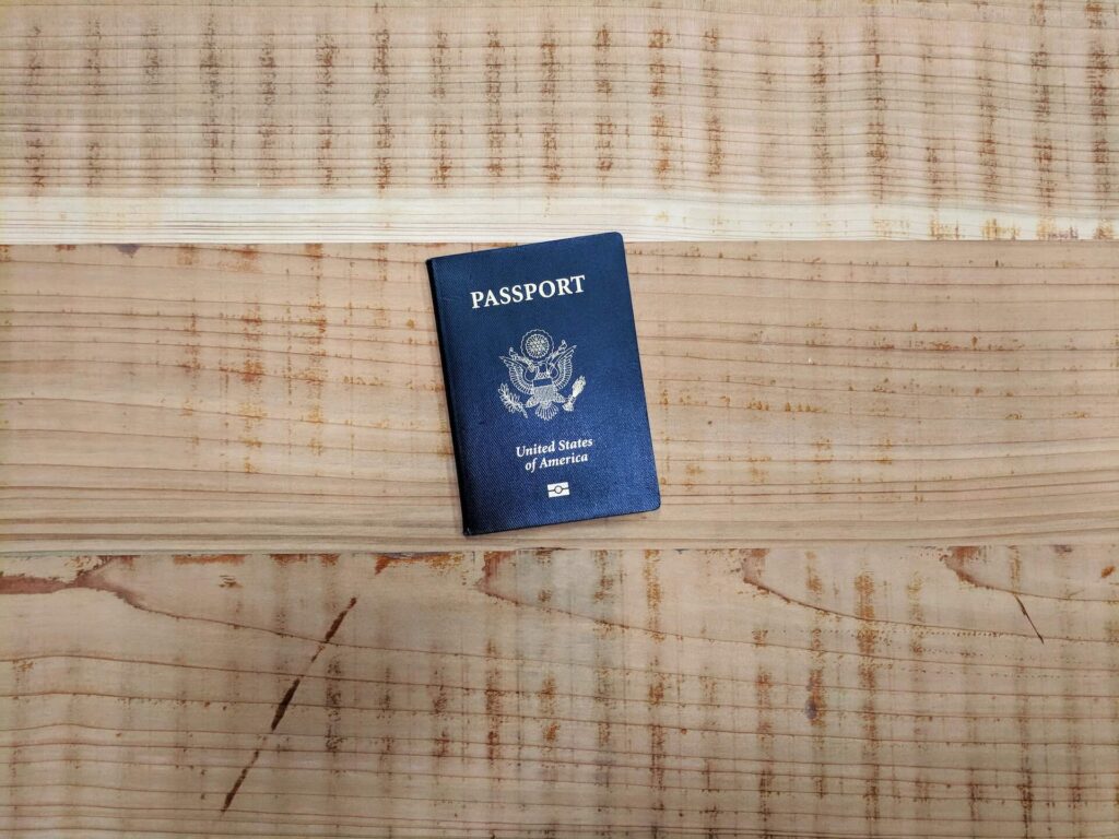 American passport on a wooden surface needed for international moving