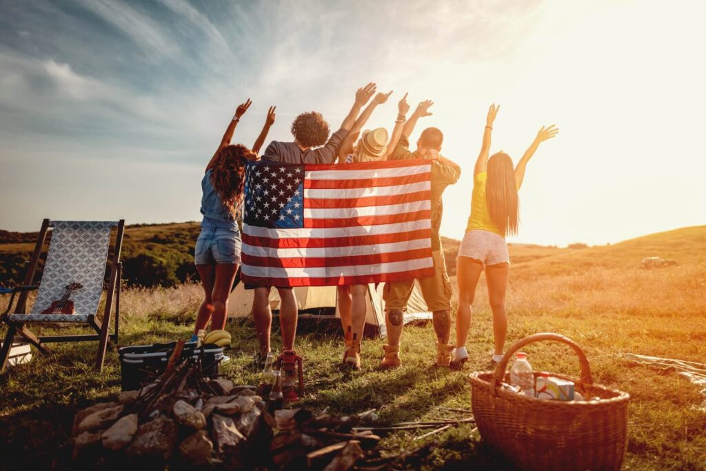 People wearing an American flag after moving internationally 