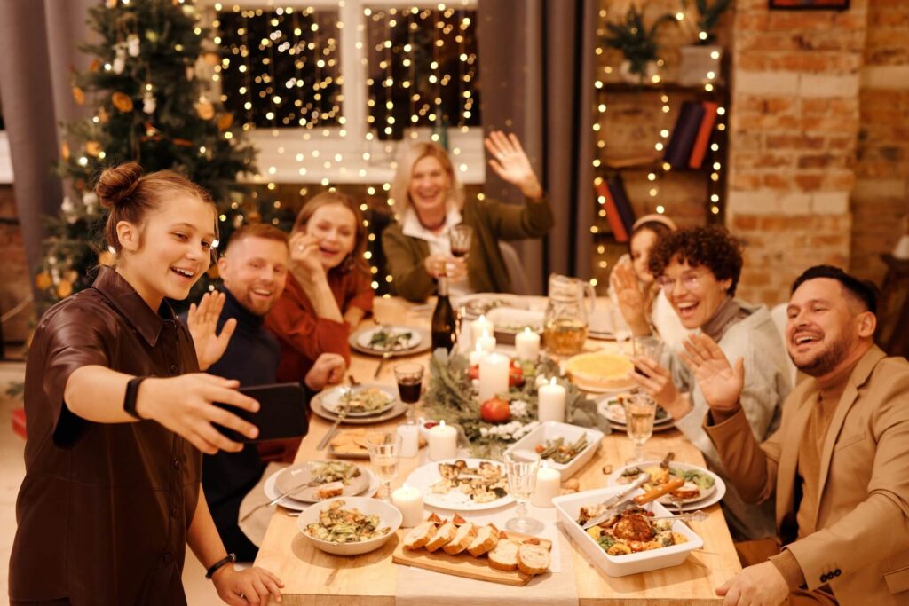 Family and friends eating together