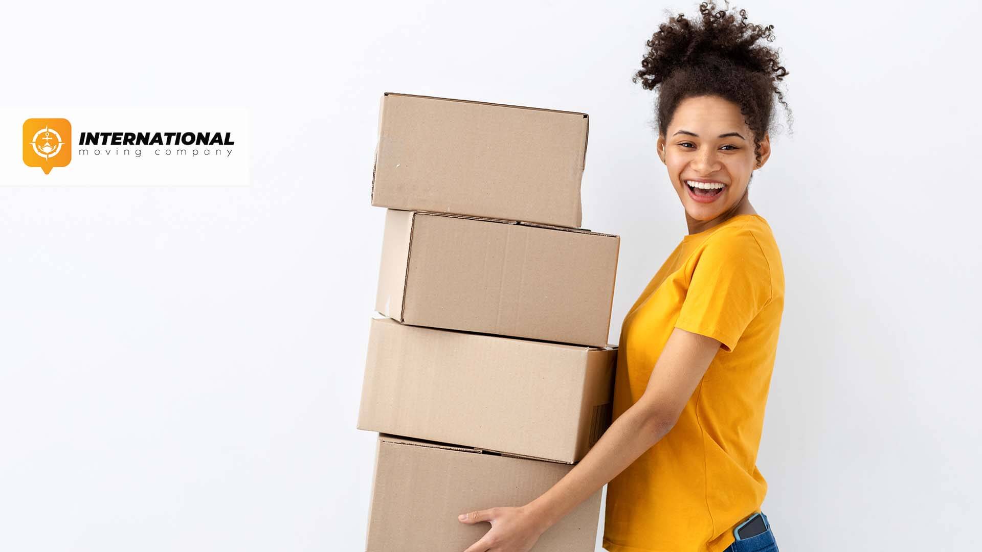 girl with boxes International Moving Company logo